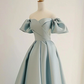 Robe de bal longue en satin bleu trapèze à col en cœur B633