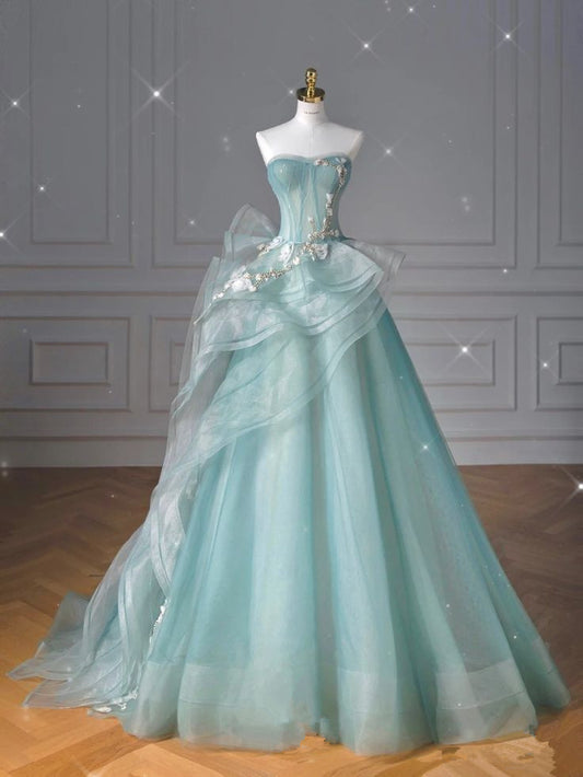 Robe de soirée longue en tulle vert à décolleté en cœur avec jolies perles et volants C3454